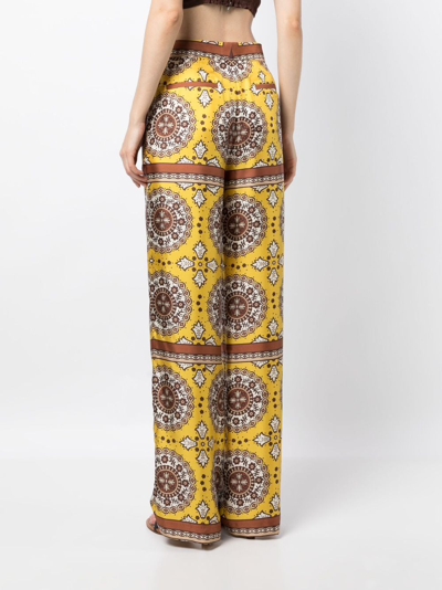 Shop Nili Lotan Germain Silk Flared Trousers In Yellow