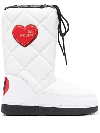 Shop Love Moschino Quilted Patent Snow Boots In White