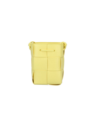 Shop Bottega Veneta Cassette Mini Bucket Bag In Yellow