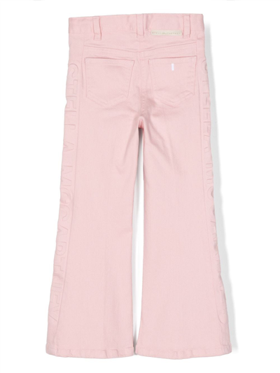 Shop Stella Mccartney Logo-appliqué Dyed Flared Jeans In Pink