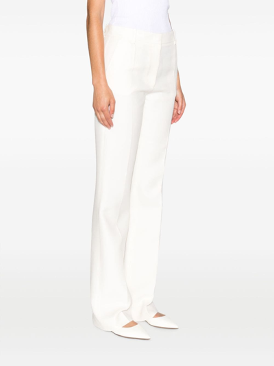 Shop Valentino High-waist Tailored Trousers In White