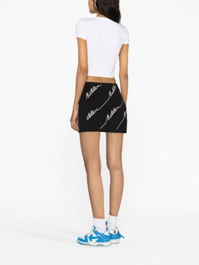 Shop Rotate Birger Christensen Logo-embellished Knitted Miniskirt In Black