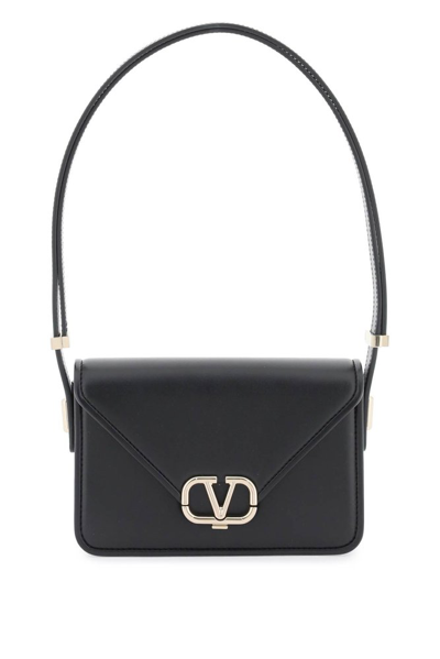 Shop Valentino Logo Plaque Foldover Top Small Shoulder Bag In Black