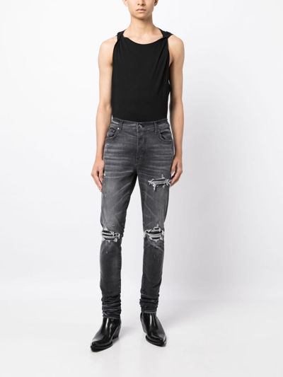 Shop Amiri Mx1 Distressed Skinny Jeans In Grey