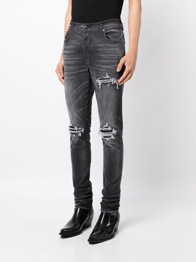 Shop Amiri Mx1 Distressed Skinny Jeans In Grey