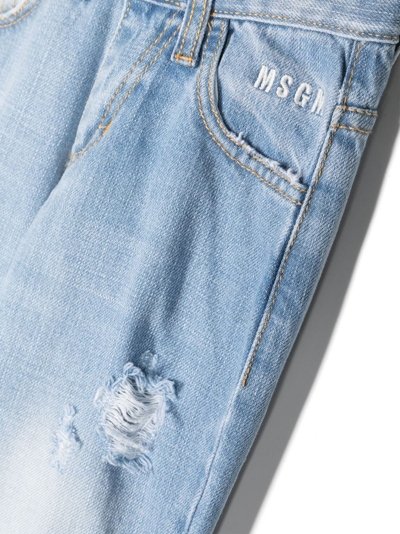 Shop Msgm Logo-embroidered Ripped-detail Jeans In Blue