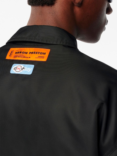 Shop Heron Preston Logo-patch Zip-fastening Polo Shirt In Black