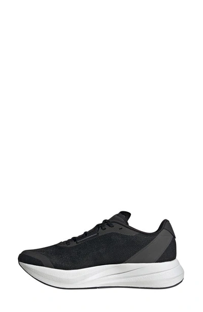 Shop Adidas Originals Duramo Speed Running Sneaker In Black/ White/ Carbon