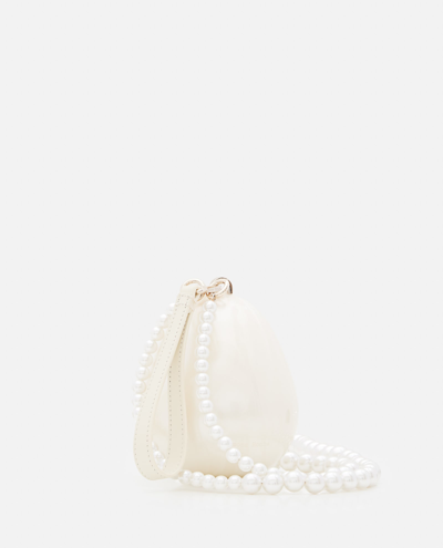 Shop Simone Rocha Pearl Micro Egg Crossbody Bag In White