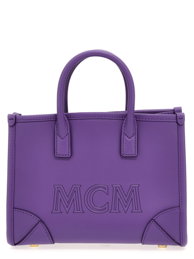 Shop Mcm Munchen Mini Shopping Bag In Purple
