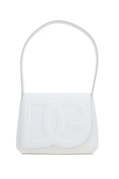 Shop Dolce & Gabbana Dg Logo Embossed Shoulder Bag In White