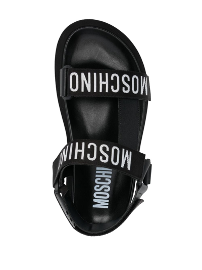 Shop Moschino Logo-strap Flat Sandals In Schwarz