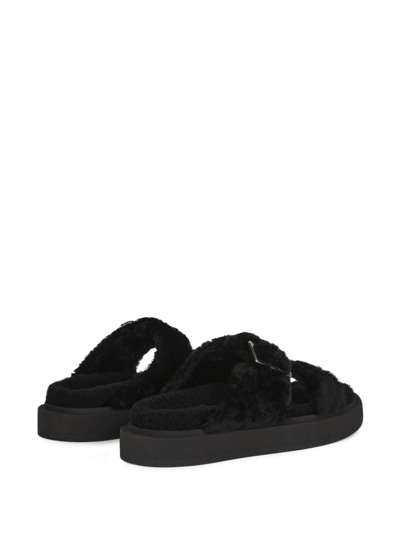 Shop Giuseppe Zanotti Furry Buckled Sheepskin Slides In Schwarz