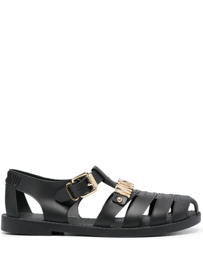 Shop Moschino Flat Sandals With Logo In Black
