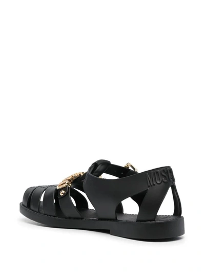 Shop Moschino Flat Sandals With Logo In Black