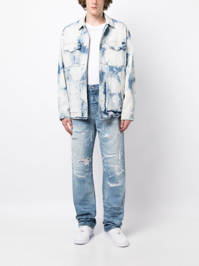 Shop Amiri Distressed Lose-fit Jeans In Blue