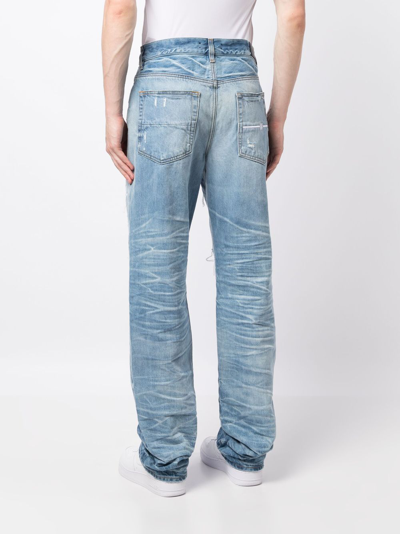 Amiri Distressed Lose-fit Jeans In Blue
