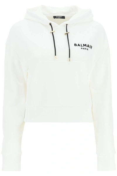 Shop Balmain Cropped Hoodie With Flocked Logo In Blanc Noir (white)