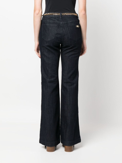 Shop Michael Michael Kors Mid-rise Flared Jeans In Blue