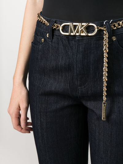 Shop Michael Michael Kors Mid-rise Flared Jeans In Blue