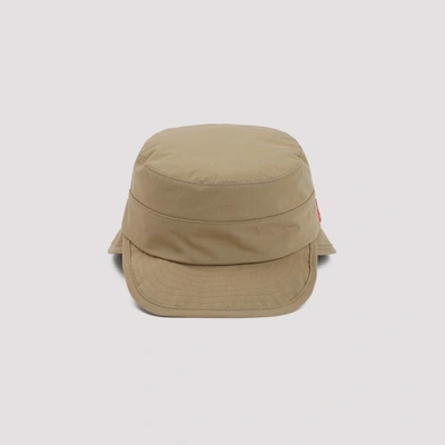 Shop Undercover Logo Tab Bucket Hat In Beige