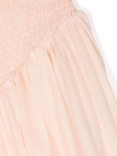Shop Chloé Smocked-waist Flared Midi Skirt In Pink