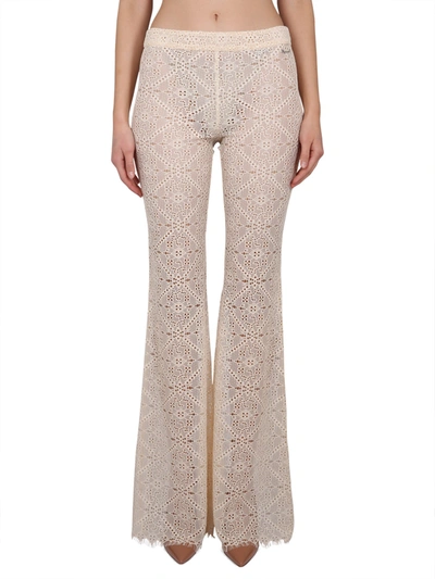 Shop Dsquared2 Pants With Embroidery In Yellow Cream