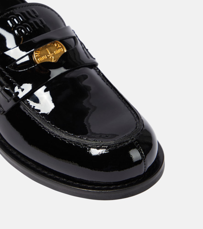 Shop Miu Miu Patent Leather Loafers In Black