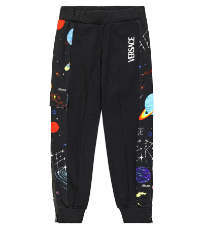 Shop Versace Printed Cotton Jersey Sweatpants In Black