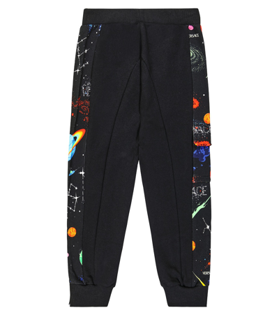 Shop Versace Printed Cotton Jersey Sweatpants In Black