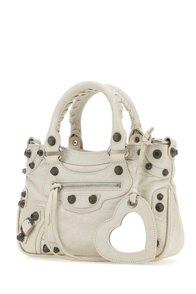 Shop Balenciaga Handbags. In White