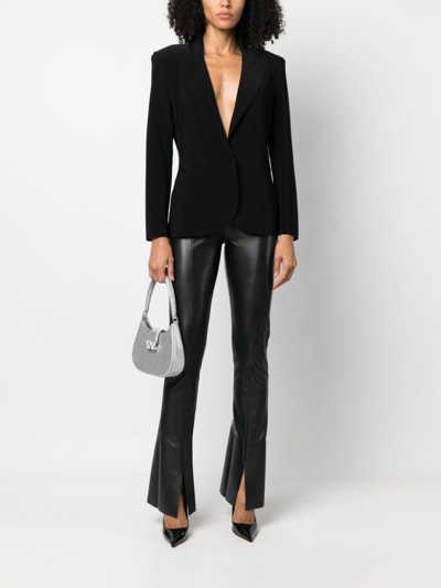 Shop Norma Kamali Faux-leather Skinny Trousers In Black