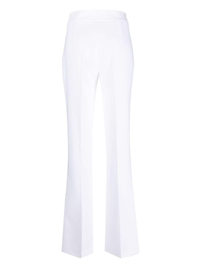Shop Genny Tailored-cut Flared Trousers In White
