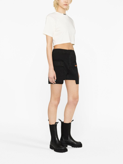 Heron Preston Distressed Rebuilt Denim Cargo Skirt In Black