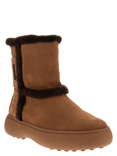 Shop Tod's Padded Suede Ankle Boot In Brown