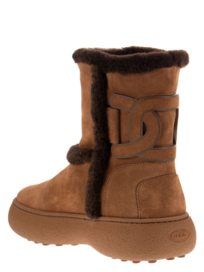 Shop Tod's Padded Suede Ankle Boot In Brown