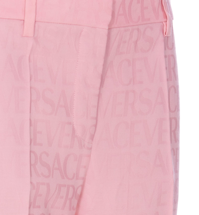 Shop Versace Allover Pants In Pink