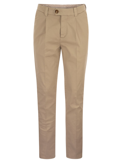 Shop Brunello Cucinelli Garment-dyed Leisure Fit Trousers In American Pima Comfort Cotton With Pleats In Sand