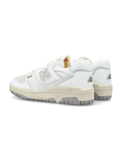 Shop New Balance 550 Low Top Sneakers In White