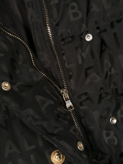 Shop Balmain Monogram-print Padded Jacket In Black
