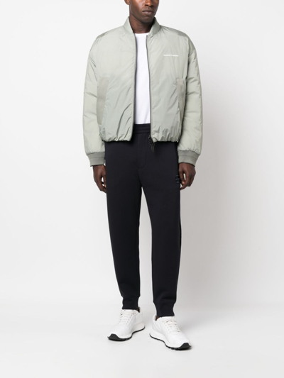 Emporio Armani Logo-embroidered Stretch-cotton Track Pants In Blue