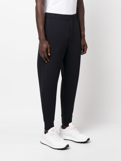 Shop Emporio Armani Logo-embroidered Stretch-cotton Track Pants In Blue