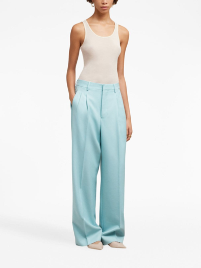 Shop Ami Alexandre Mattiussi Pleated Long-length Wool Trousers In Blue