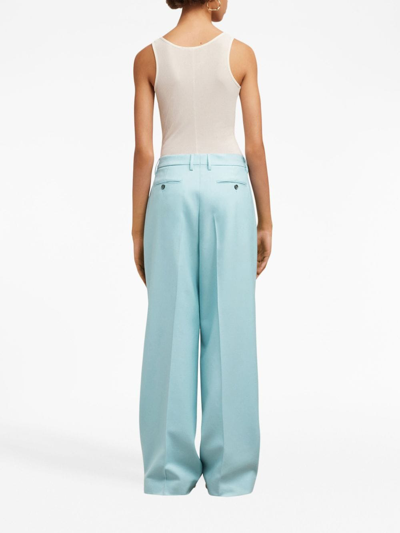 Shop Ami Alexandre Mattiussi Pleated Long-length Wool Trousers In Blue