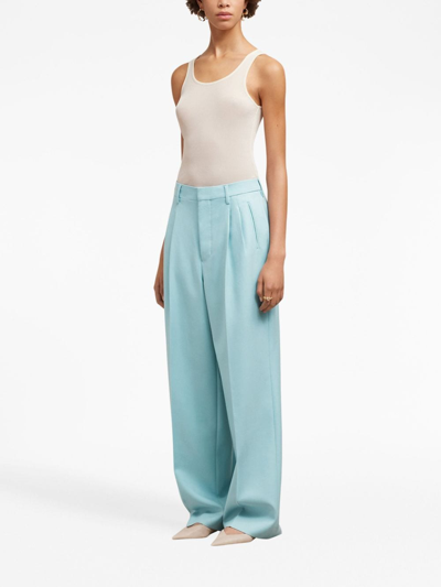 Shop Ami Alexandre Mattiussi Pleated Long-length Wool Trousers In Blue