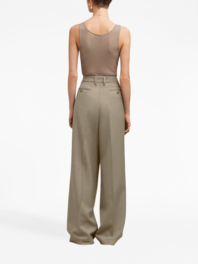 Ami Alexandre Mattiussi Pleated Virgin-wool High-waisted Trousers In Neutrals