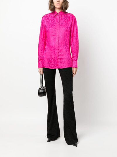 Versace Greca-jacquard Flared Trousers In Black