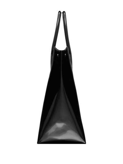 Shop Saint Laurent Rive Gauche Leather Tote Bag In Black
