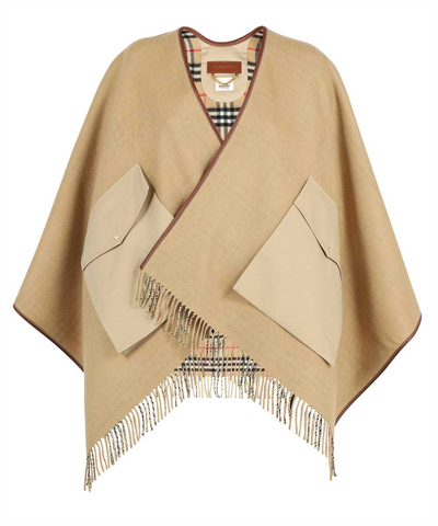 Shop Burberry Solid Poncho In Beige