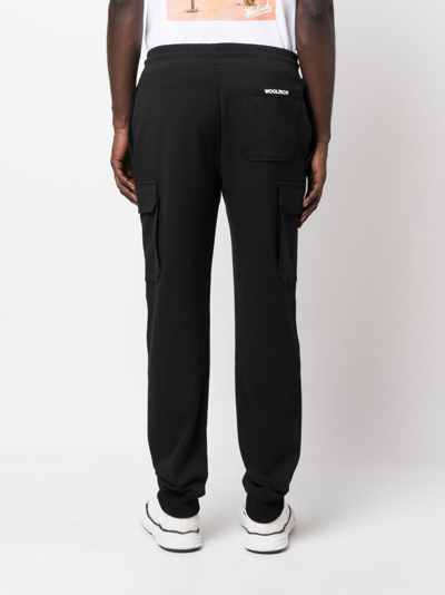 Shop Woolrich Logo-print Cargo Track Pants In Black